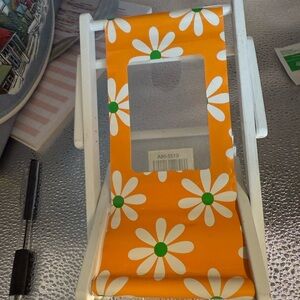 Beach chair with orange background and daisies picture frame